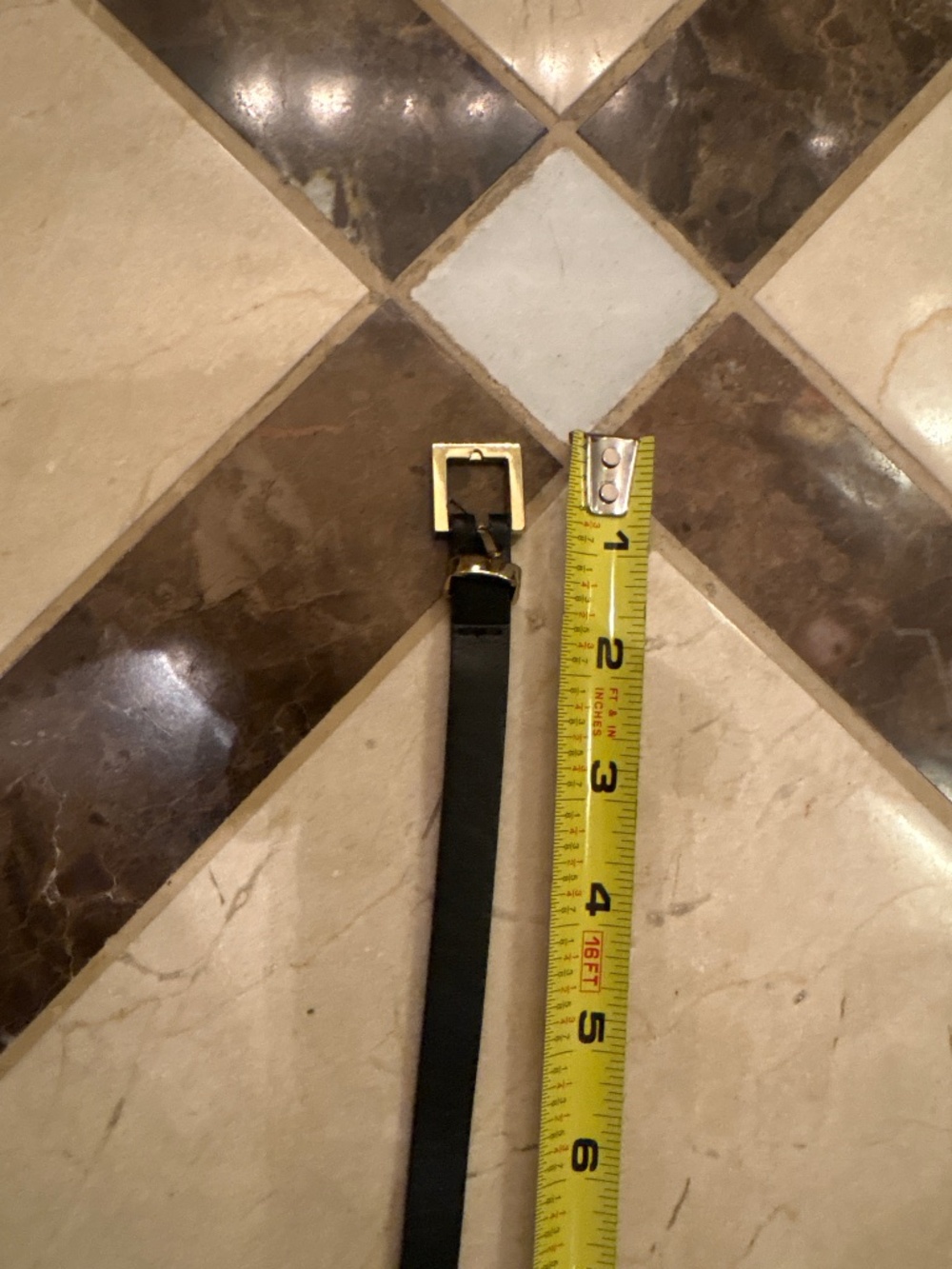 Women’s black and gold belt